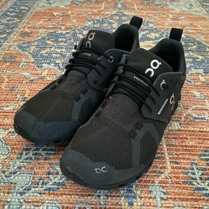 Size 8 Black On Cloud waterproof running shoe.